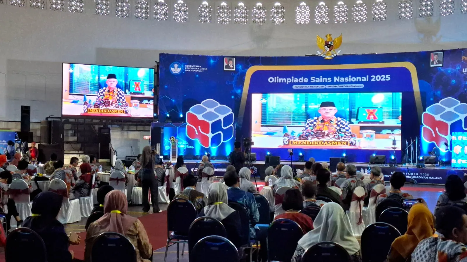 Sambutan dari Menteri Dikdasmen Abdul Mut'i secara virtual kepada peserta OSN 2025. Foto: Azmy