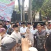 Anggota DPRD Jatim sekaligus tokoh PKB, Hikmah Bafaqih berorasi dalam aksi demo santri di Kota Malang. (Foto/M Sholeh)