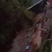 Bangunan rumah kos ambrol ke Sungai Braholo di Landungsari. Foto: BPBD Kabupaten Malang