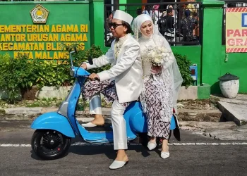 Rizky Boncell dan istrinya