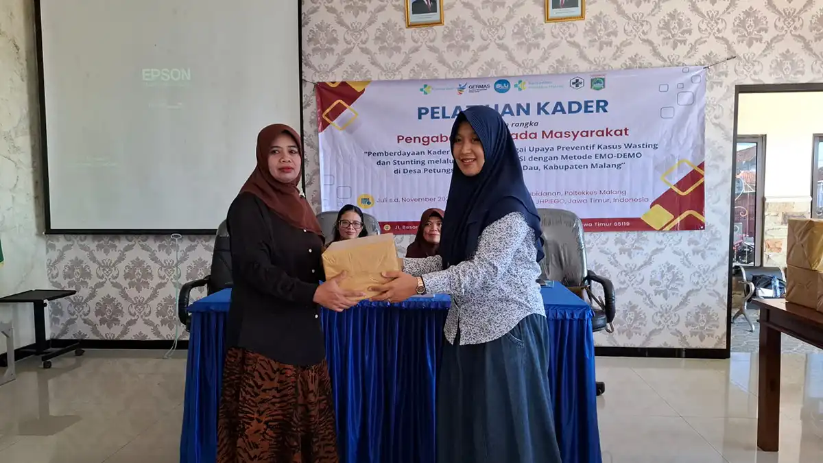 Ketua Pengabmas, Gita Kostania 
