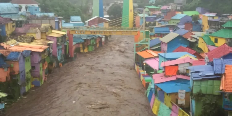 Ilustrasi banjir di Kota Malang. (Foto/M Sholeh)