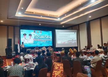 Kepala Bapenda Kota Malang, Handi Priyanto melakukan sosialisasi terkait Opsen PKB dan BBNKB. (Foto/M Sholeh)