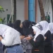 Pelaksanaan upacara Peringatan Hari Guru Nasional 2025 di SMKN 2 Malang berlangsung khidmat dan semakin lengkap dengan deretan prestasi yang diraih siswa. /Foto: Dok. SMKN 2 Malang