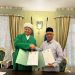Dr Isroqunnajah MAg bersama Albir Krganov. Foto/dok UIN Malang
