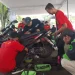 Pengabdian masyarakat SMK El Hayat Malang untuk driver ojol di Malang. (Foto/M Sholeh)