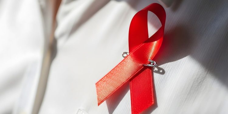 Pita merah simbol solidaritas untuk penderita HIV. Foto: Pixabay.com/DreamBrush