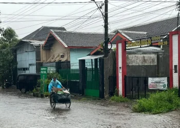 Prakiraan cuaca Malang, terutama di wilayah Kota Malang pada hari Rabu, 19 Desember 2025 yang diperkirakan dalam kondisi hujan ringan. /Foto: Tugumalang.id/Bagus Rachmad Saputra.
