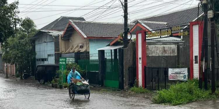 Prakiraan cuaca Malang, terutama di wilayah Kota Malang pada hari Rabu, 19 Desember 2025 yang diperkirakan dalam kondisi hujan ringan. /Foto: Tugumalang.id/Bagus Rachmad Saputra.