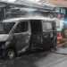 Petugas Damkar Kota Malang melakukan pemadaman api yang melahap mobil dan 2 ruko. (Foto/M Sholeh)