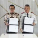 Wali Kota Batu Nurochman saat menandatangni nota kesepahaman pelaksanaan hukuman pidana kerja sosial bersama Bapas Kelas I Malang. Foto: Prokopim KWB