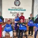 Para lansia di Griya Lansia Husnul Khatimah menerima bantuan sembako dari BRI. Foto: BRI Malang