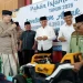 Suasana kemeriahan saat Iwan Kurniawan menghibur anak yatim