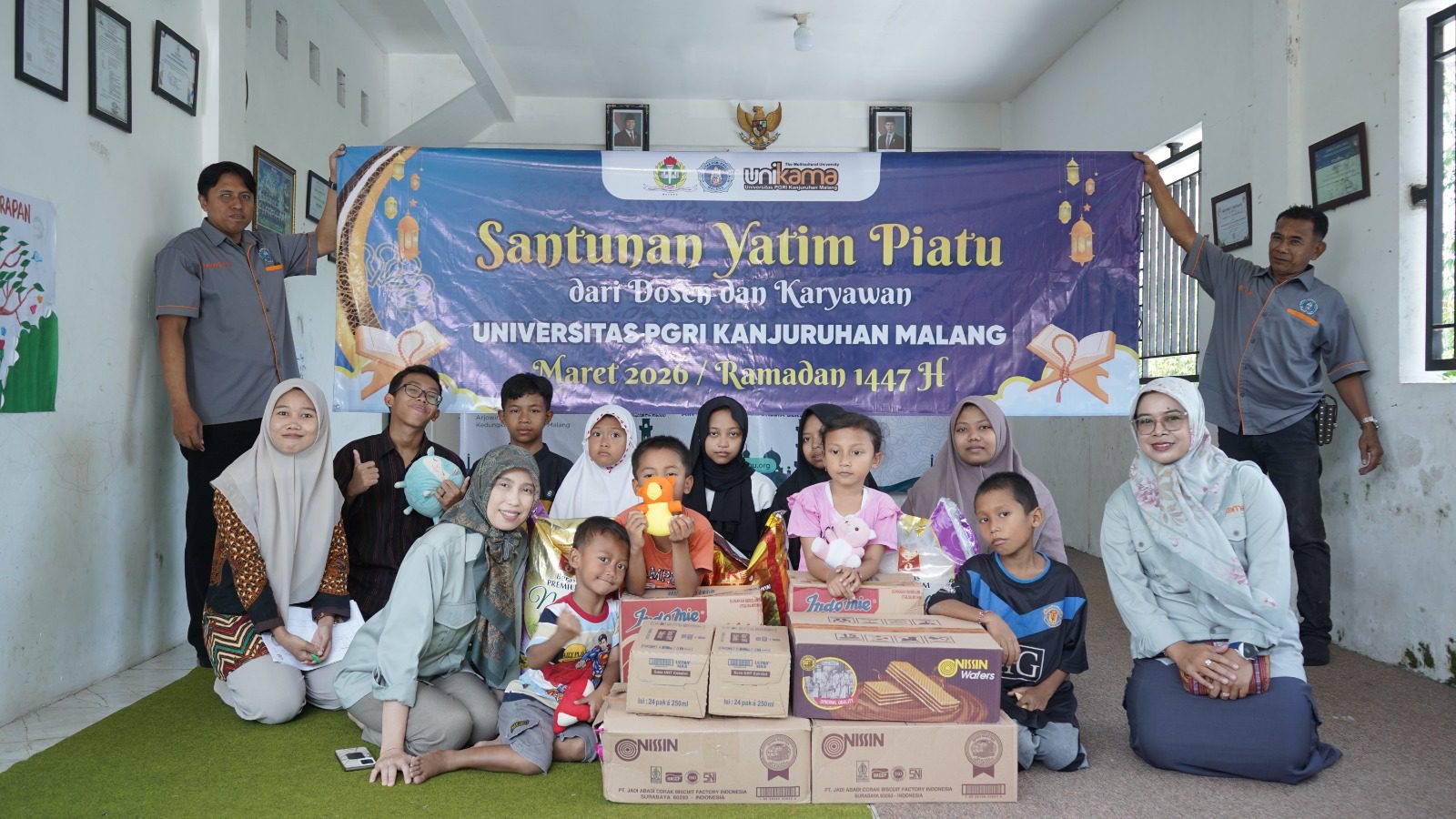 Keceriaan anak yatim piatu yang mengikuti kegiatan santunan bersama keluarga besar Unikama. /Foto: Dok. Unikama.