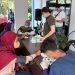Suasana antusiasme masyarakat Desa Karangkates mengakses layanan kesehatan gratis hingga sembako murah dari PJT I. Foto: Dok.