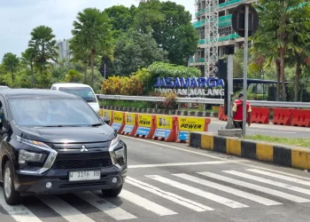 Ilustrasi kendaraan melintasi Gerbang Tol Singosari. Foto: Aisyah Nawangsari Putri