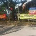 Banner penolakan warga atas keberadaan toko miras di kawasan Sawojajar, Kota Malang. (Foto/M Sholeh)