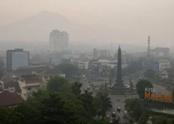Prakiraan cuaca Malang, khususnya di Kota Malang pada Jumat, 22 Mei 2026 dalam kondisi udara kabur. /Foto: Ilustrasi dibuat dengan AI.