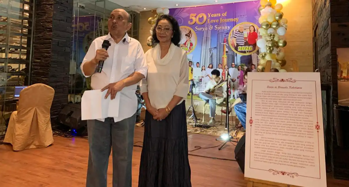 Surya Burhanuddin dan sang istri Sjenny Jamain