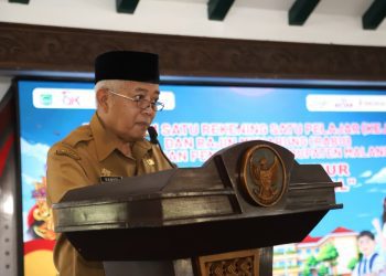 Bupati Malang, Sanusi saat memberikan sambutan di kegiatan sosialisasi program KEJAR dan RABU. Foto: Pemkab Malang